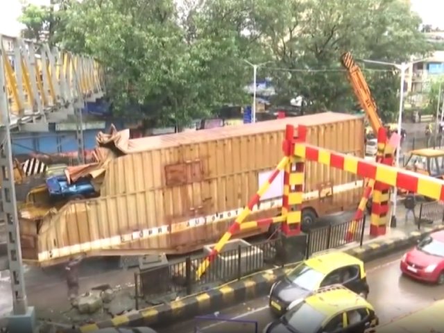 Container Truck Stuck Under Railway Bridge Triggers Traffic Jam In Mumbai