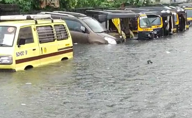 Heavy Rain In Parts Of Mumbai, Local Train Services Hit