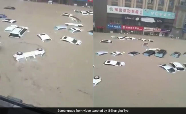 Video: Cars Float Down A Road After Devastating Floods In China