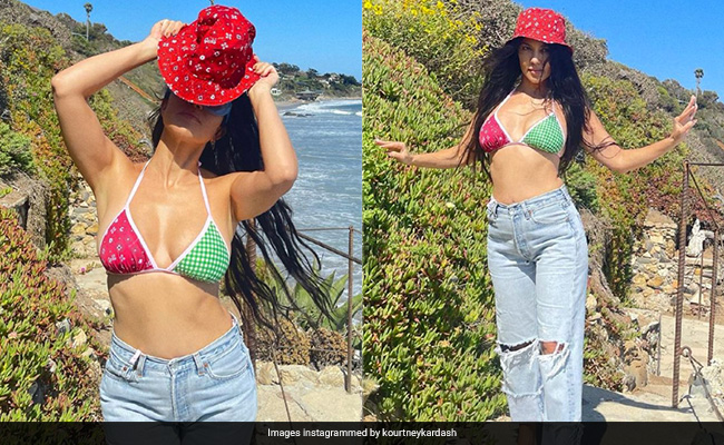 Kourtney Kardashian Can Wear Her Bikini With Anything, Even Ripped Jeans And A Bucket Hat