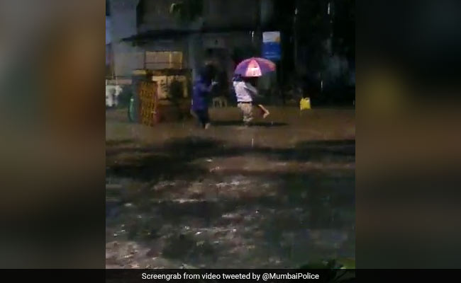 Watch: Mumbai Cop Helps Father-Daughter To Safety Amid Heavy Rain