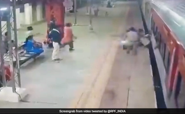 Watch: Man Falls Trying To Board Moving Train, Gets Dragged, Saved By Cop