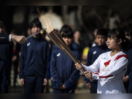 Tokyo Games: Tokyo Scraps Torch Relay Legs Due To Coronavirus Concerns