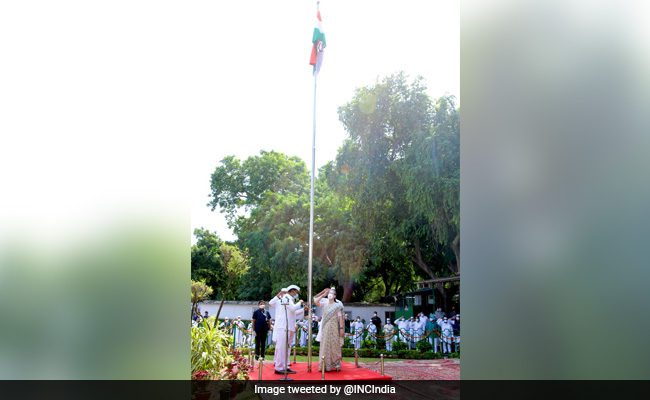 Sonia Gandhi Unfurls National Flag At Congress Headquarters