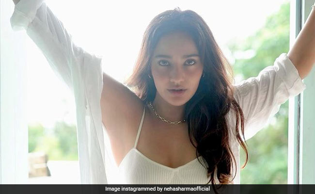 Neha Sharma In A White Ribbed Bikini Set Deserves To Be Grabbing Some Rays On The Beach