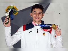 Spain's Alberto Gines Lopez Becomes First Olympic Sport Climbing Champion