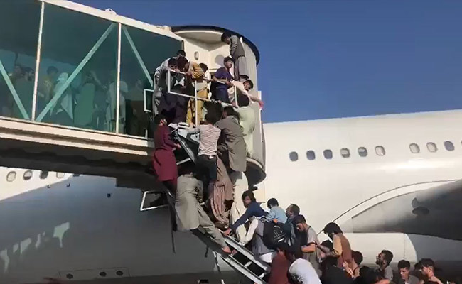 Video: Hundreds Jostle To Board Plane - Desperate Scenes At Kabul Airport