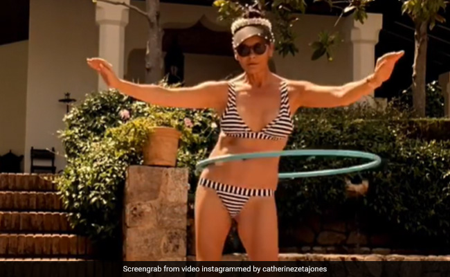 Catherine Zeta-Jones, 51, Is "In A Twist" Mode. See Her Fun Clip Here