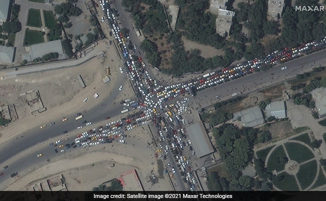 Exclusive: Kabul Satellite Images Show Huge Crowds Desperate To Get Out