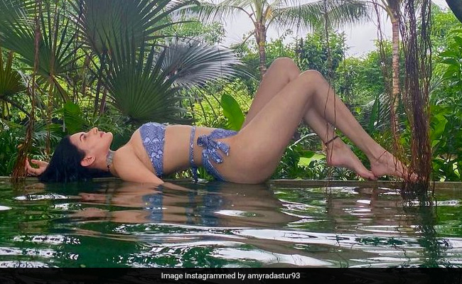 Amyra Dastur Is Busy Embracing The Simple Pleasures Of Mother Nature In A Printed Blue Bikini