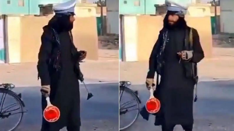 बंदूक के साथ ट्रैफिक कंट्रोल कर रहा है अफगानिस्तान की नई ट्रैफिक पुलिस, लोगों ने कहा- अब नो चलान, सीधा जाएगी जान!