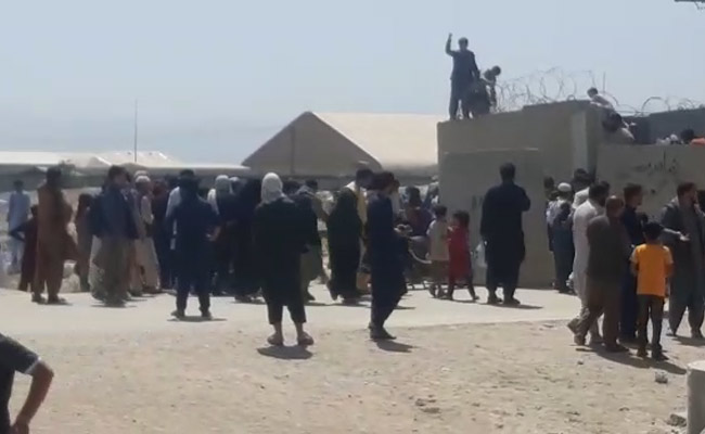 Video: Gunfire, People Scale Walls In Kabul Airport Meltdown