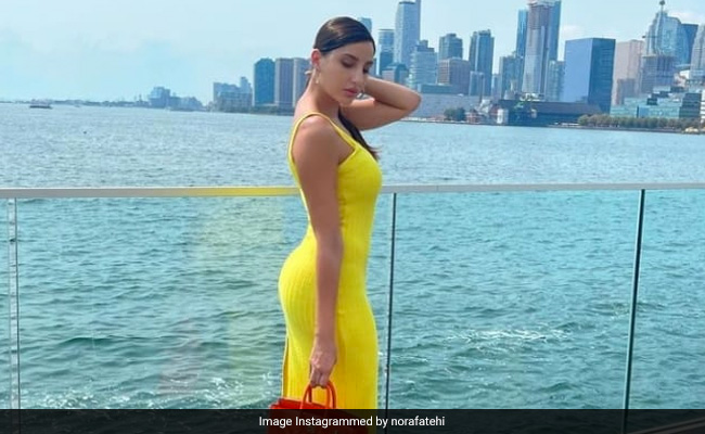 येलो ड्रेस पहन नोरा फतेही ने यूं ढाया कहर, स्टाइलिश अंदाज के दीवाने हुए फैन्स...Photos वायरल