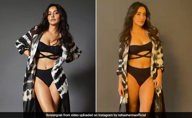 Neha Sharma's Black Cutout Bikini Gets A Chic Beach Look With Tie-Dye Printed Jacket
