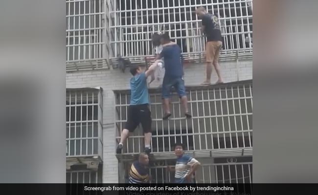 Watch: 6 Men Form Human Chain To Rescue Children From Burning Building