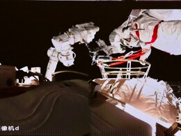 China's Astronauts Make Spacewalk To Upgrade Robotic Arm