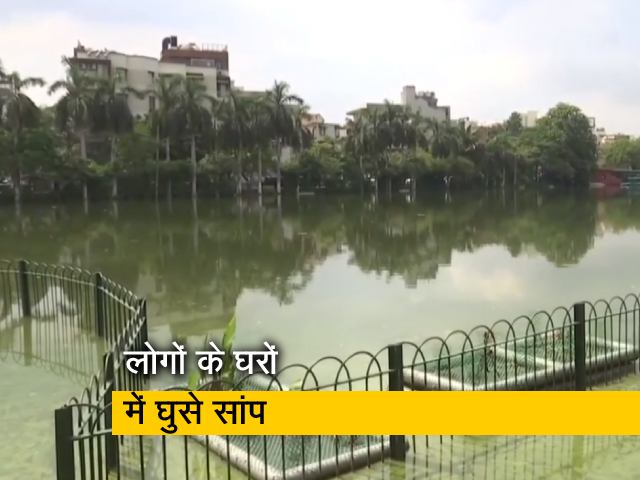 भारी बारिश से दिल्ली की नैनी झील उफान पर, जनजीवन अस्त-व्यस्त