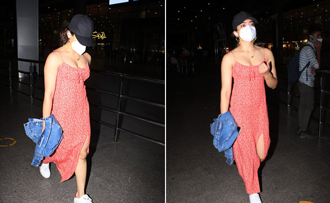 Rashmika Mandanna Gives Her Airport Look A Chic Summer Twist With A Strappy Maxi Dress And Sneakers
