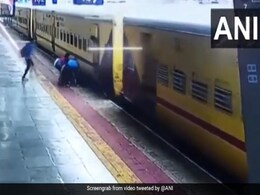Video: Woman Slips Trying To Board Moving Train, Passengers Rescue Her Video: Woman Slips Trying To Board Moving Train, Passengers Rescue Her