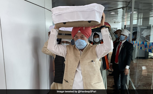 Video: Minister Receives Guru Granth Sahib At Delhi Airport, 3 Copies Flown From Kabul