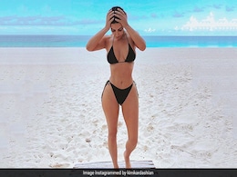 Kim Kardashian's Stunning Black Bikini Is Proof That Summer Starts And Ends With Her Kim Kardashian's Stunning Black Bikini Is Proof That Summer Starts And Ends With Her