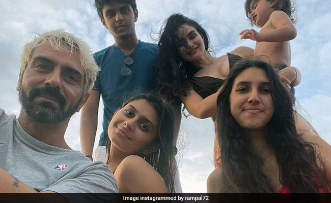 Arjun Rampal Sends A Family Postcard. Arik Steals The Show In The Pic