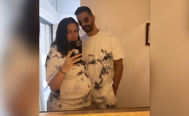 Neha Dhupia Showcases Her Baby Bump And Adorably Matches Angad Bedi In Tie-Dye