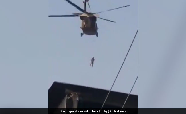 After US Exit, Video Of Taliban Flying US Chopper With Man Dangling