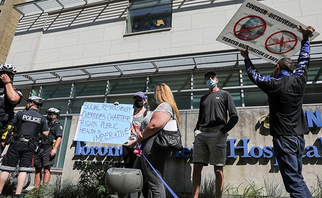 Canadian Man Punches Nurse For Giving Wife Covid Jab "Without Consent"