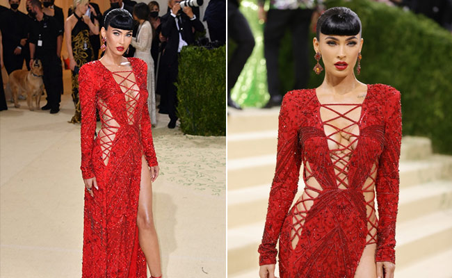 Please Excuse Megan Fox As She Burns Up The Pink Carpet In Her Red Tie-Up Lace Dress