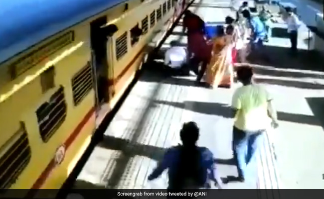 Video: Woman Slips Trying To Board Moving Train, Passengers Rescue Her