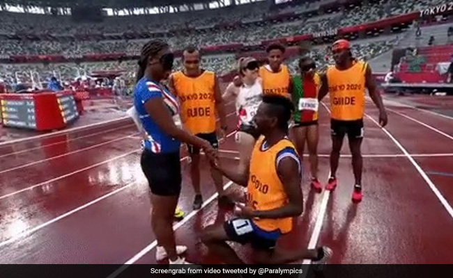 Watch: Guide Surprises Paralympic Sprinter With Finish-Line Proposal