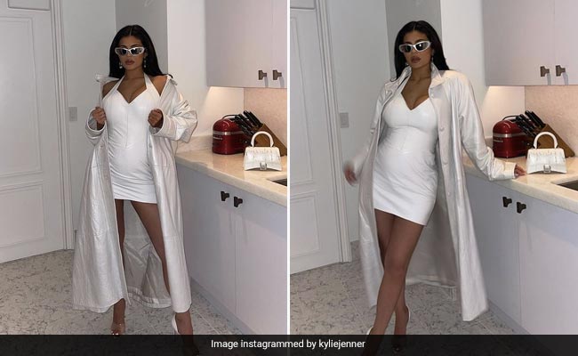 Kylie Jenner Debuts Her Baby Bump In A Stunning White Halter Dress