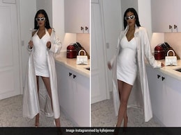 Kylie Jenner Debuts Her Baby Bump In A Stunning White Halter Dress Kylie Jenner Debuts Her Baby Bump In A Stunning White Halter Dress