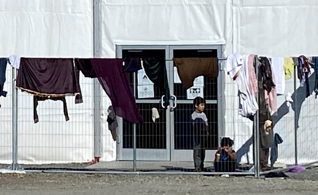 Weeks After Fleeing Home, Afghans Try To Pick Up Pieces At US Military Base