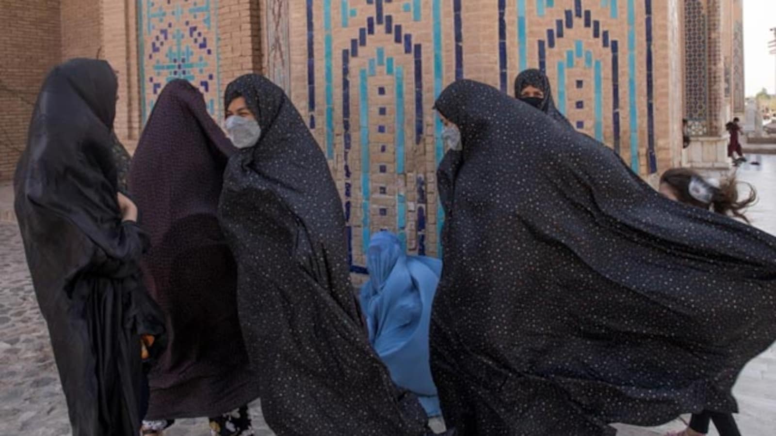 'No Right To Breathe Freely': Afghan Women Detained In Clothing Crackdown