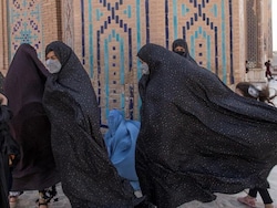 'No Right To Breathe Freely': Afghan Women Detained In Clothing Crackdown