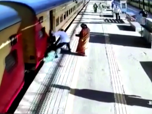 Video: Woman Slips Trying To Board Moving Train, Passengers Rescue Her