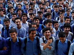 Taliban Say Afghan Boys' School To Reopen, No Mention Of Girls