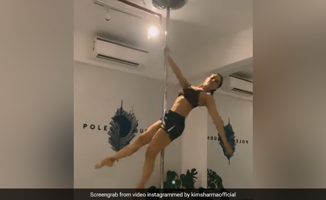 Just Kim Sharma Pole Dancing. No Caption Needed