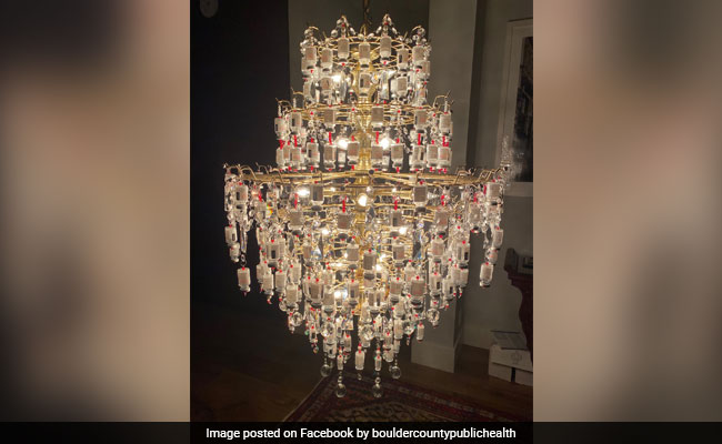 A Chandelier Made Up Of Used Vaccine Vials Is Lighting Up Social Media