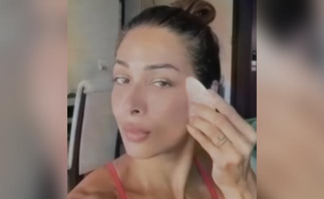Malaika Arora's "Favourite Thing To Do" With A Gua Sha Is The Answer To Radiant, Firm Skin