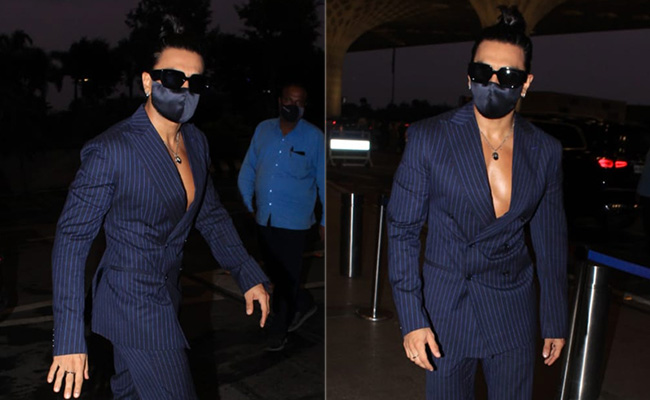 Ranveer Singh Suits Up In Style To The Airport Without A Shirt In Sight