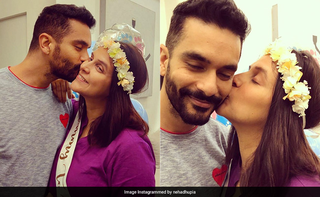 Mom-To-Be Neha Dhupia Looks Adorable In A Flower Crown And Purple Dress For Her Baby Shower