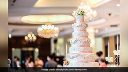 Watch: Wait, What? This Four-Tiered Wedding Cake May Be Fake