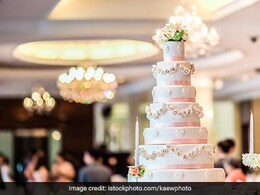 Watch: Wait, What? This Four-Tiered Wedding Cake May Be Fake