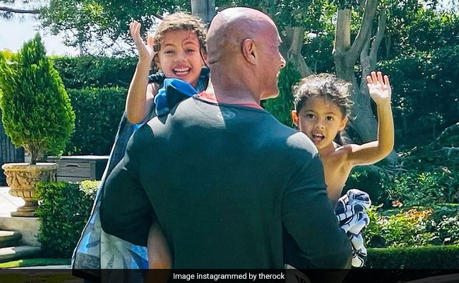 Dwayne Johnson's Dad Life: What Daughters' "Fun Pool Day" Translates To