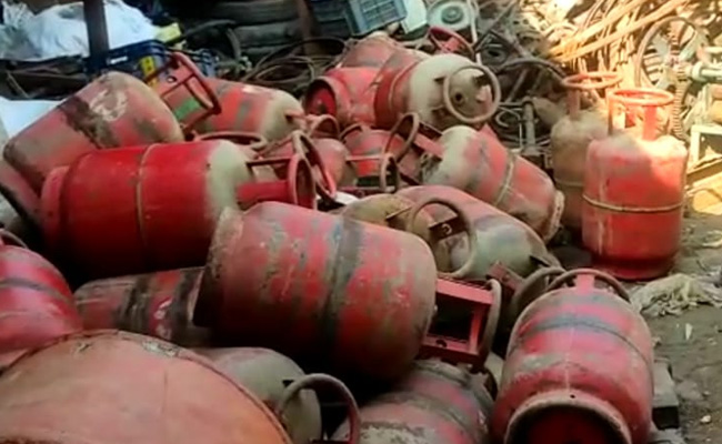 Cooking Gas Cylinders At Scrapyard Fuel Congress Fire At Centre's Scheme