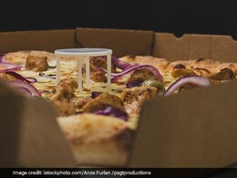 Ever Wondered Why Pizza Comes With A Tiny Table? Funny Video Explains