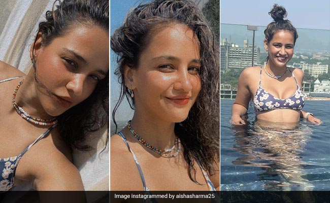 Aisha Sharma Has Her "Tan Game On Point" In A Fun Floral Daisy Printed Bikini In The Pool